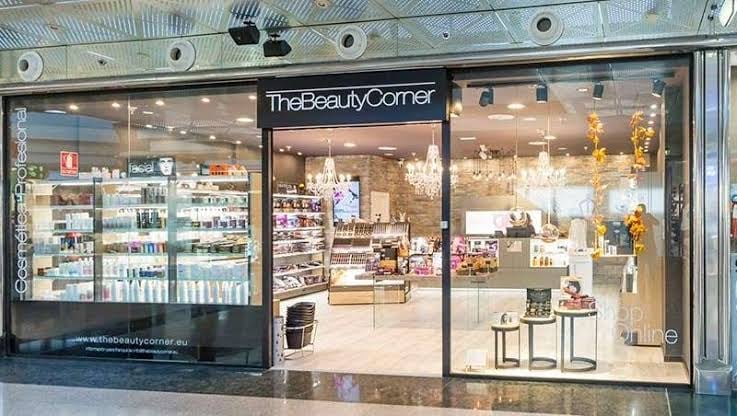 TheBeautyCorner storefront with large glass windows displaying beauty products and cosmetics in a modern retail setting